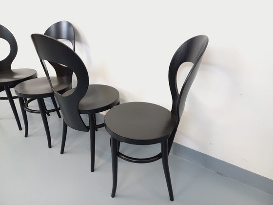 Image 1 of Set van 4 vintage Baumann Mouette stoelen in zwart hout uit de jaren 70.