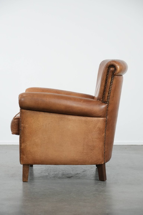 Image 1 of Poltrona vintage in pelle di pecora con carattere