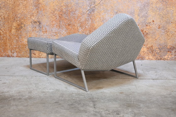 Image 1 of Sillón Leolux Wibber único en tela blanca y negra con otomana.