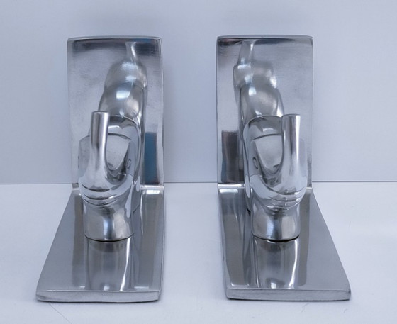 Image 1 of een paar boekensteunen in de vorm van olifanten, gegoten aluminium