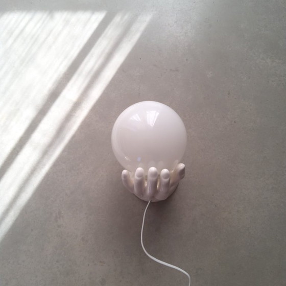 Image 1 of Lampada da parete scultorea in porcellana, mano in ceramica con sfera in vetro