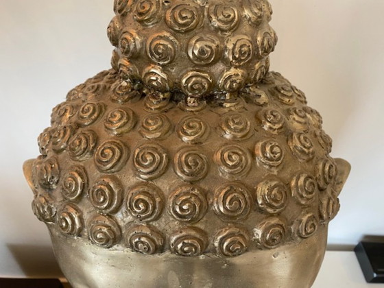 Image 1 of Estatua única de Buda sobre una base de madera, obra de Eicholtz.