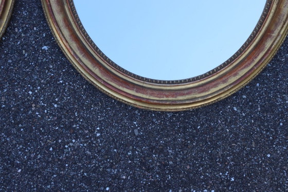 Image 1 of Pair of oval Louis Philippe period mirrors in giltwood