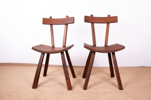 Pair of Brutalist Elm chairs in the style of Jean Touret Artisans de Marolles 1960.