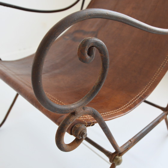 Image 1 of Paire de fauteuils en fer forgé et cuir vintage
