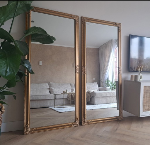 2 grandes espejos de aspecto antiguo en bronce dorado con facetas