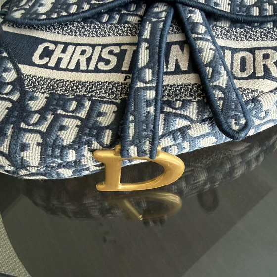 Image 1 of DIOR SADDLE MEDIUM - OBLIQUE CANVAS MONOGRAM DARK BLUE GOLD HARDWARE