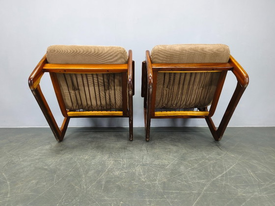 Image 1 of Twee Scandinavische loungestoelen uit de jaren 70, gemaakt van hout met corduroy bekleding.