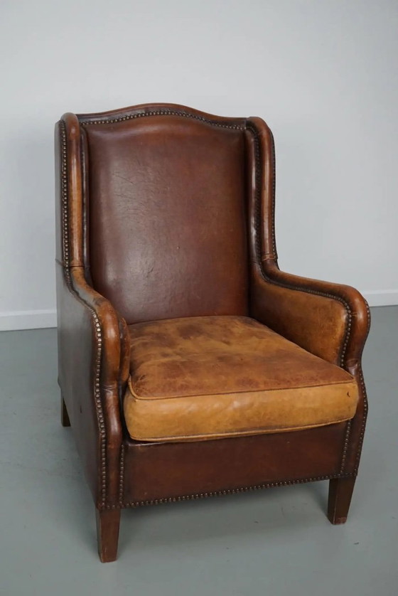 Image 1 of Vintage Nederlandse clubfauteuil van cognackleurig leer