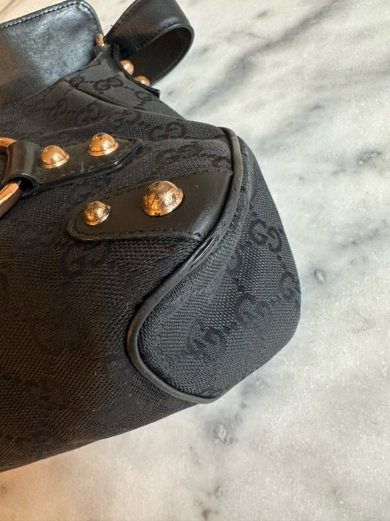 Image 1 of borsa con morsetto per cavalli