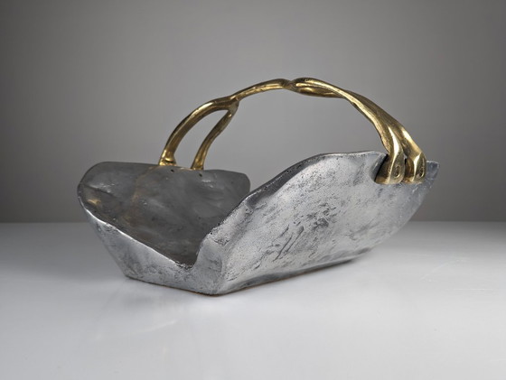 Image 1 of firewood holder by David Marshall, 1980s