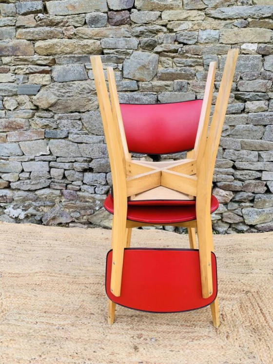 Image 1 of Ein Paar rote Stühle