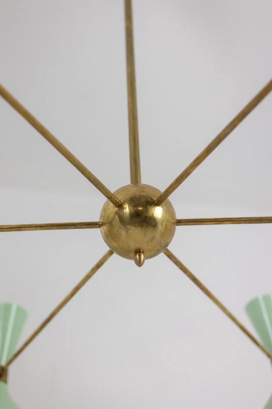 Image 1 of Lustre rayonnant de forme diabolo à 12 lumières. Contemporain.