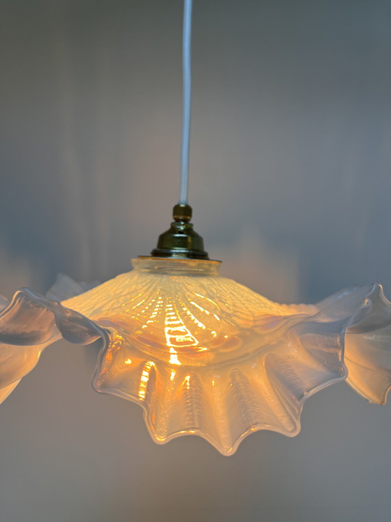 Image 1 of Atmospheric vintage pendant light featuring a distinctive glass shade, likely of French origin