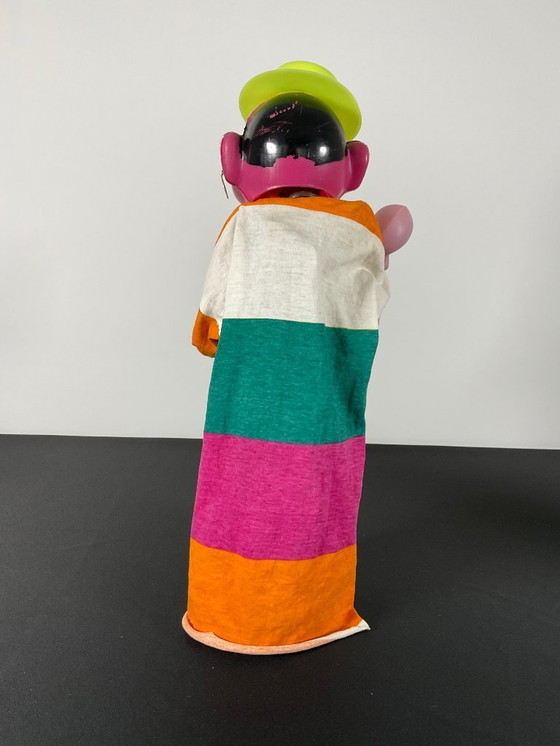 Image 1 of Paar oude bokshandpoppen Aziatische man en clown