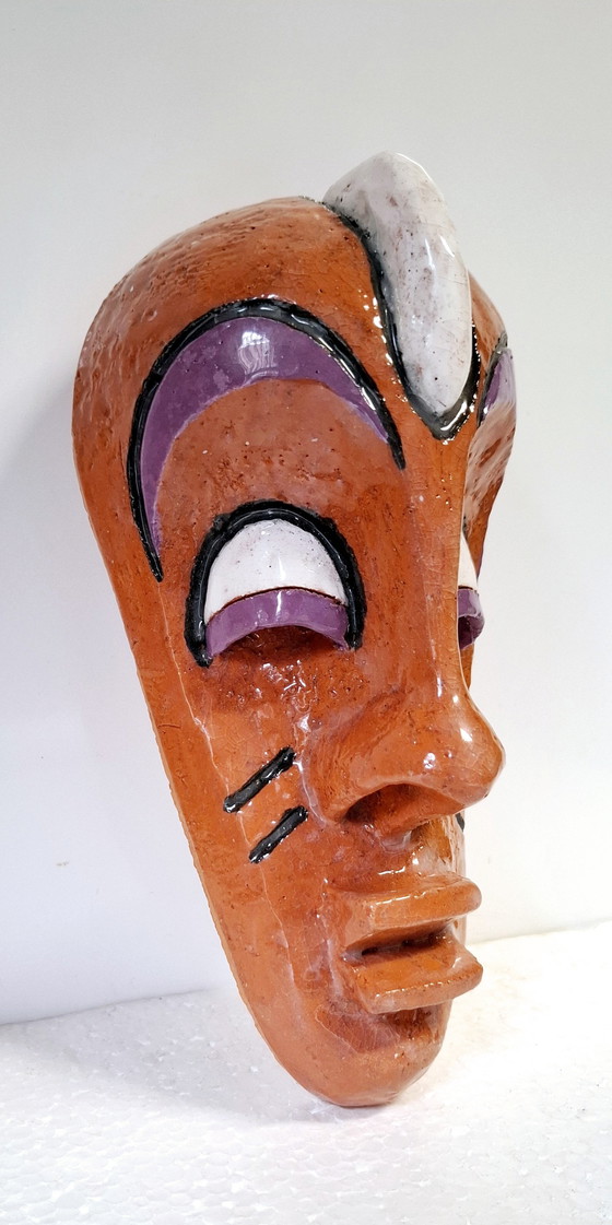 Image 1 of Masque africain en céramique .