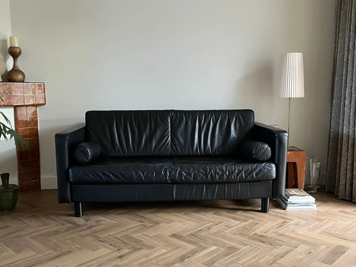 Divano in pelle nera di design Touché