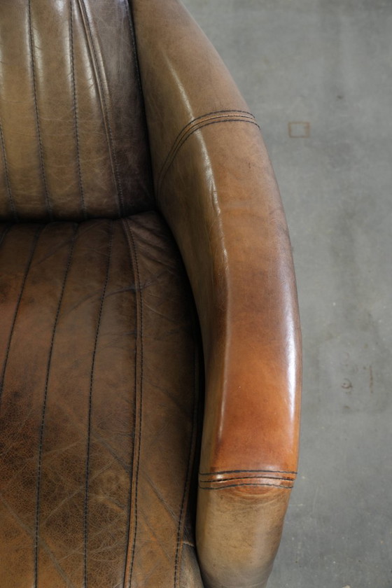 Robuster und charaktervoller Aviator Design Clubsessel aus Rindsleder mit einzigartiger Aluminiumoberfläche (photo 8 of 12)