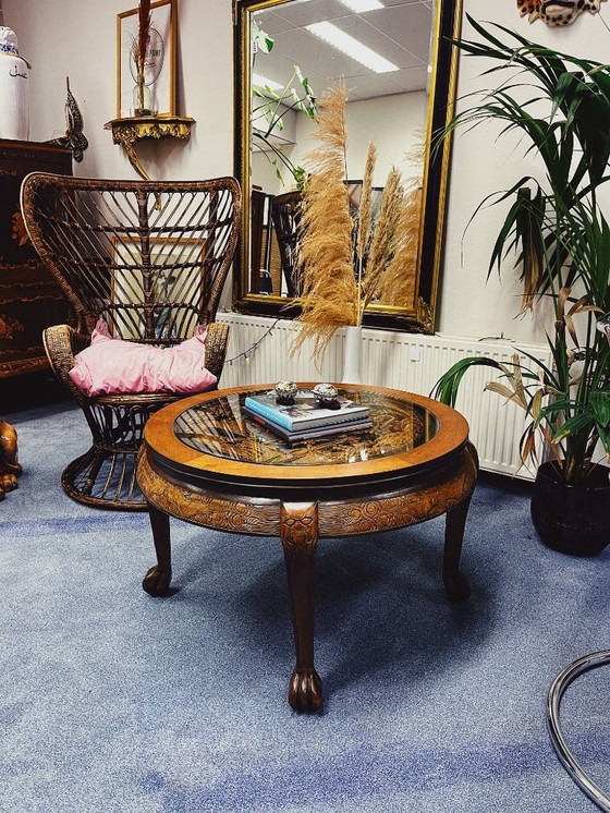 Image 1 of Round Wooden Coffee Table with Asian Carved Top