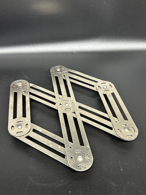 Image 1 of 1950s metal trivet