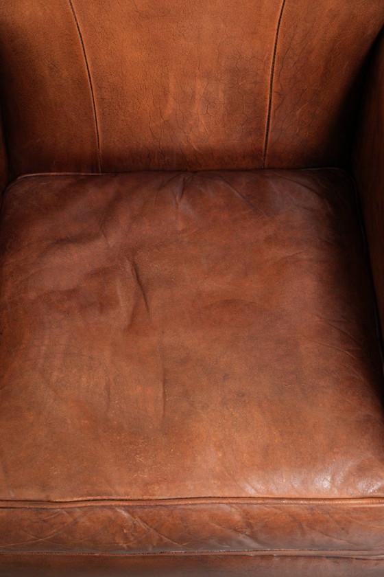 Vintage schapenleren armchair met een comfortabele zit en afgewerkt met siernagels – Fauteuils, Leather (photo 6 of 14)
