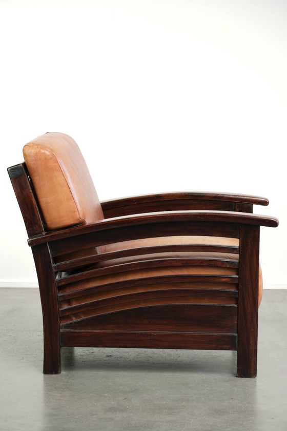Comfortable and beautiful cognac-colored cowhide leather armchair in luxurious Art Deco design – Klassiek (photo 3 of 12)
