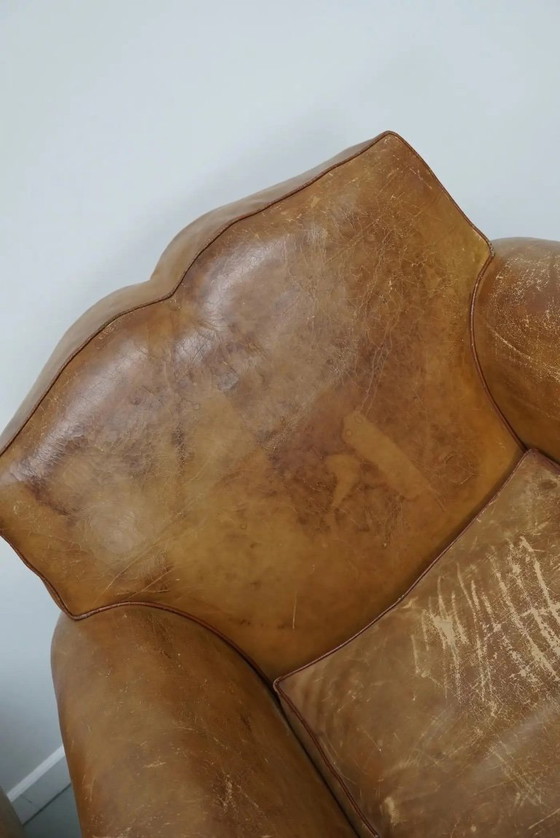Image 1 of Ein Paar französischer cognacfarbener Ledersessel mit schnurrbartförmigen Rückenlehnen, 1940er Jahre