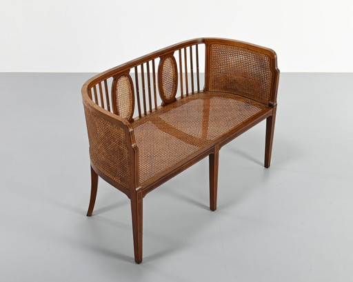 Vintage caned slant bench, 1950s