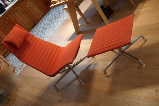 Eames aluminum Lounge chair with footstool coral red as new