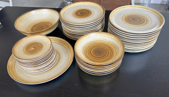 Image 1 of Longchamp zandstenen bord service 42 stuks