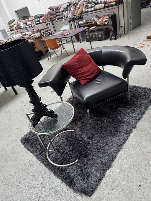Ego Form loveseat tullip + Kartell lamp + Eileen Gray table