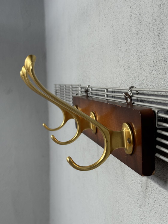 Image 1 of Appendiabiti vintage con ganci dorati - eleganza e carattere
