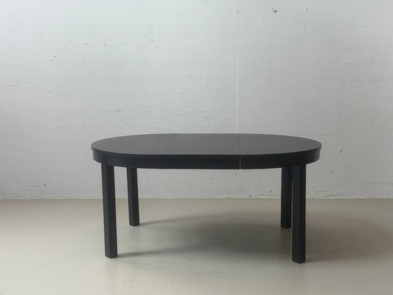 IKEA BJURSTA extendable dining table in black-brown – Wood (photo 12 of 14)