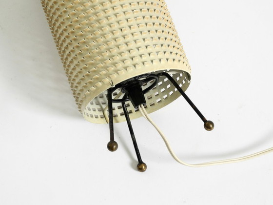 Image 1 of Original 1950s brass tripod table lamp with a perforated metal lampshade