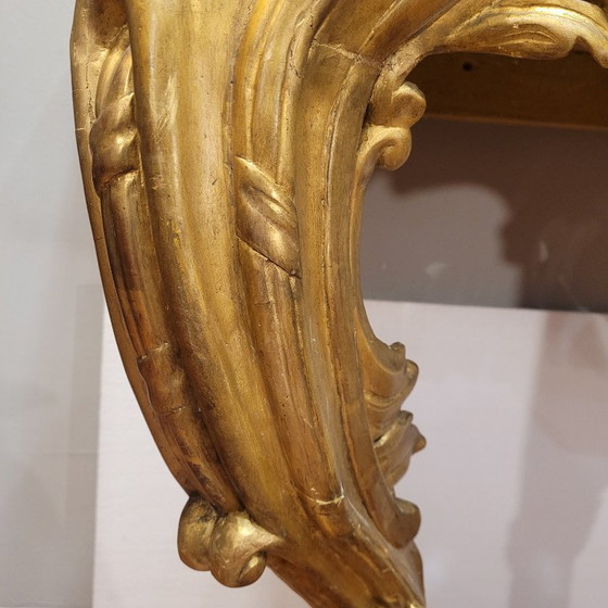 Image 1 of Consolle a muro, in legno intagliato e dorato, stile Luigi XV, XVIII secolo – Francia