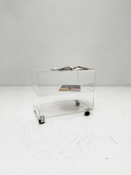 Space Age side table small made of plexiglass on castors