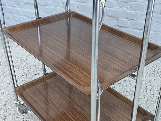 Image 1 of Vintage Foldable and Mobile Chrome Steel 3 Faux Wood Layers ‘Dinett’ Serving Trolley by Gerlinol, Germany, 1970s. 