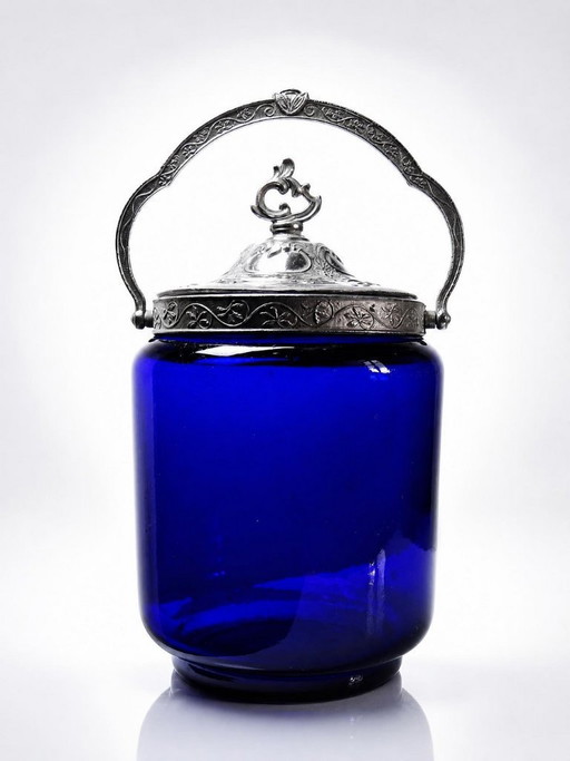 Tarro antiguo para galletas o dulces, de cristal azul cobalto y metal plateado, principios del siglo XX.