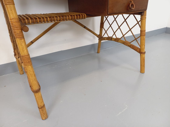 Image 1 of Vintage Louis Sognot bureau in rotan en hout uit de jaren 60