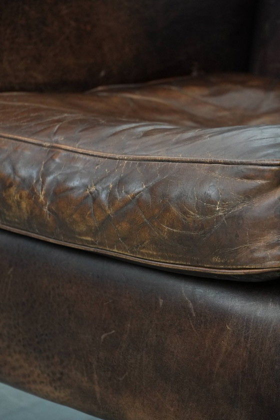 Image 1 of Vintage schapenleren armchair met een ronde vormgeving 