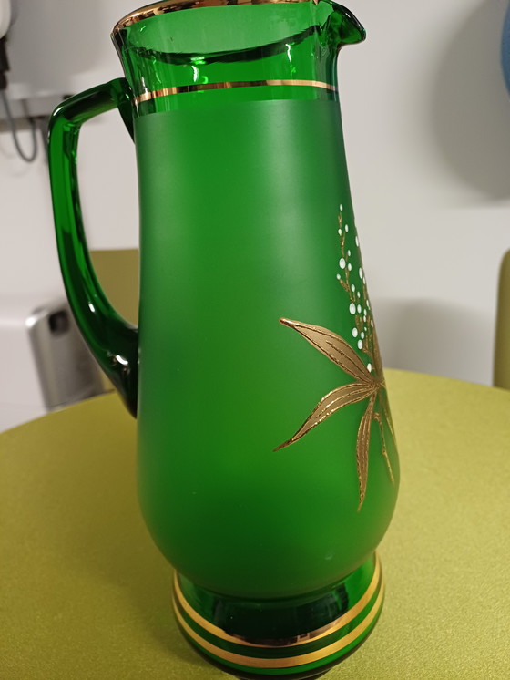 Image 1 of Vintage vase green with gold overlay.