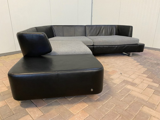 Image 1 of Canapé d'angle en cuir noir Natuzzi Opus – Confort luxueux – Design moderne et élégant – Livraison gratuite