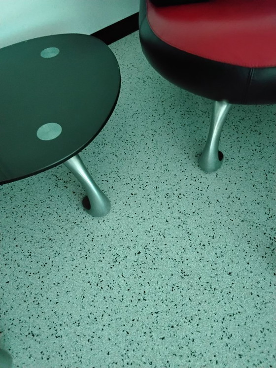 Image 1 of Set of Leolux Chi chairs with side table, footstool, and cushion.