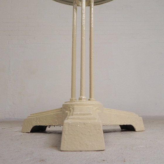 Bistro table with cast iron legs and round steel top, 1930s – Dining tables (photo 7 of 22)