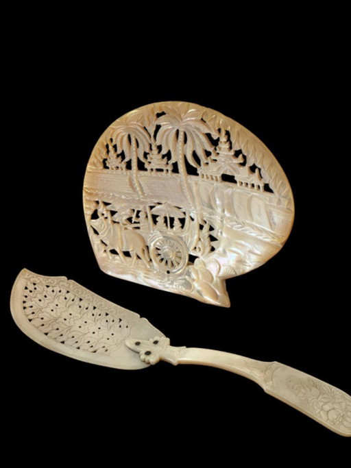 Old mother-of-pearl cutting board and cake/fish knife