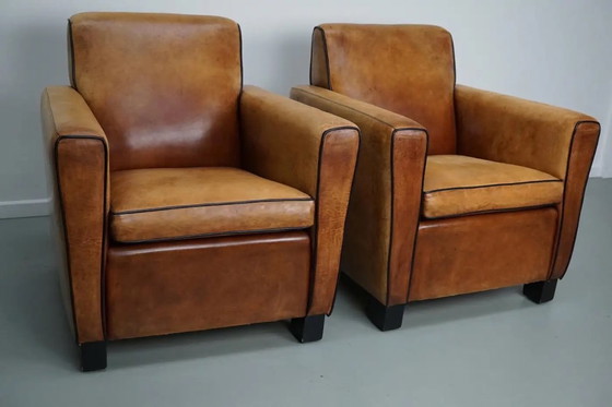 Image 1 of Vintage Nederlandse clubfauteuils van cognackleurig leer, set van 2