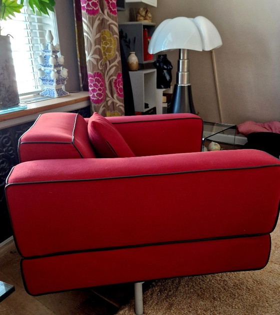 Sillón giratorio Cassina Reef rojo con ribetes de cuero. – Sillones, Leather (photo 2 of 6)