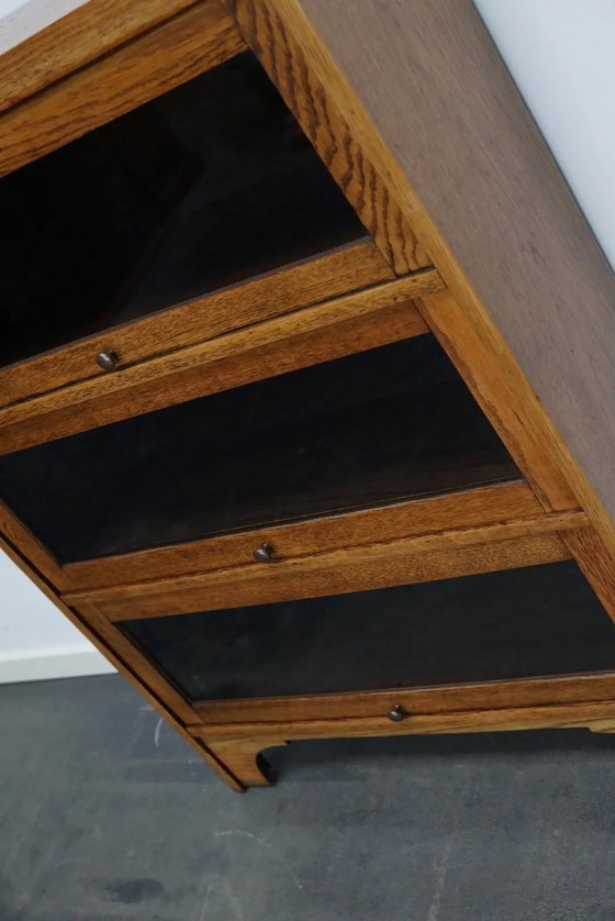 Image 1 of Duitse eiken boekenkast met schuifdeuren in de stijl van Globe Wernicke, ca. jaren 1930