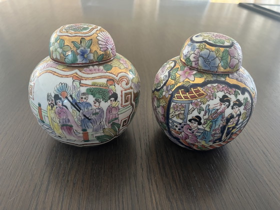 Image 1 of Set of 2 Japanese hand-painted Kutani ginger jars with lids and wooden feet