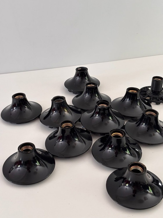 Image 1 of Komposition aus 13 Teti Vico Magistretti Wandleuchten für Artemide, 1970, schwarz lackiertes ABS, Space-Age-Finish